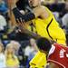 Michigan junior Jordan Morgan looks to shoot around North Carolina State senior Richard Howell during the first half at Crisler Center on Tuesday night. Melanie Maxwell I AnnArbor.com